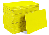 OrsonLew.com photo of a stack of blank yellow PVC cards